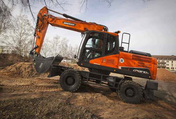 Аренда колесного экскаватора DOOSAN DX210W с грейфером